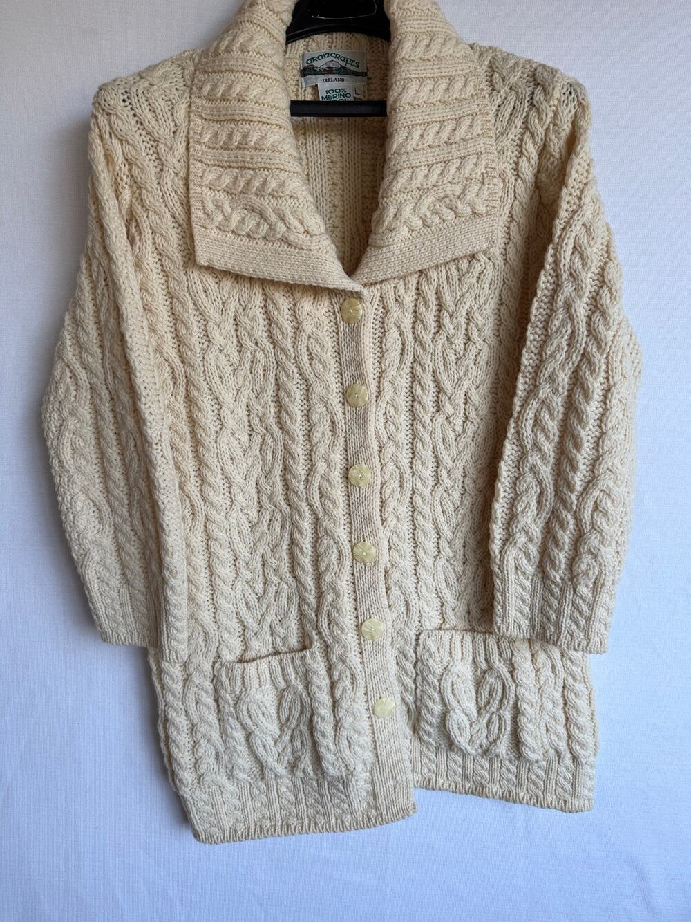 Aran Crafts women's cable knit cardigan crafted from 100% Merino wool